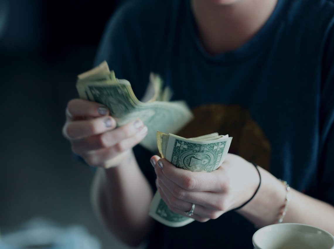 woman counting money