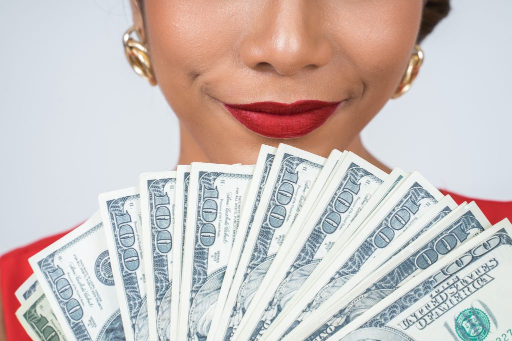 Woman holding money